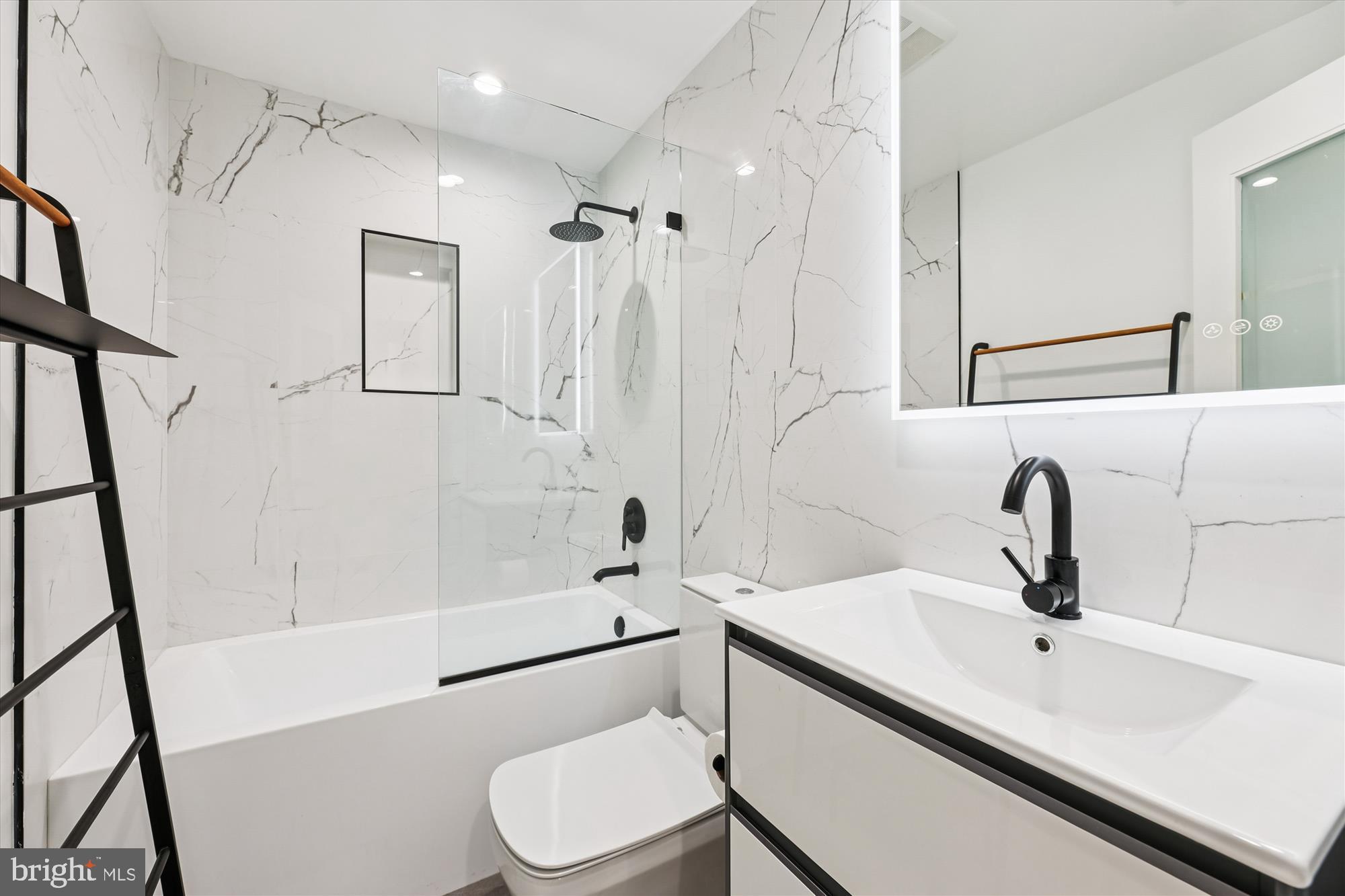 746 Morton Street Northwest, Unit 1 Washington, DC 20010 - Photo 20 of 35 a bathroom with a sink toilet and shower