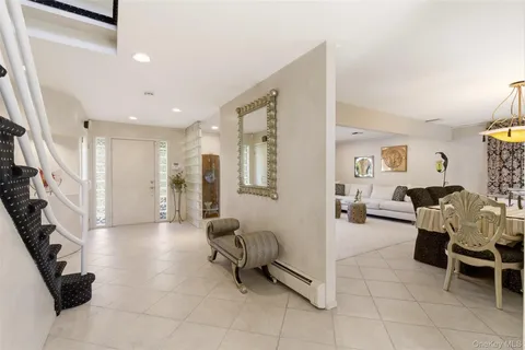 a view of a livingroom with furniture and a couch