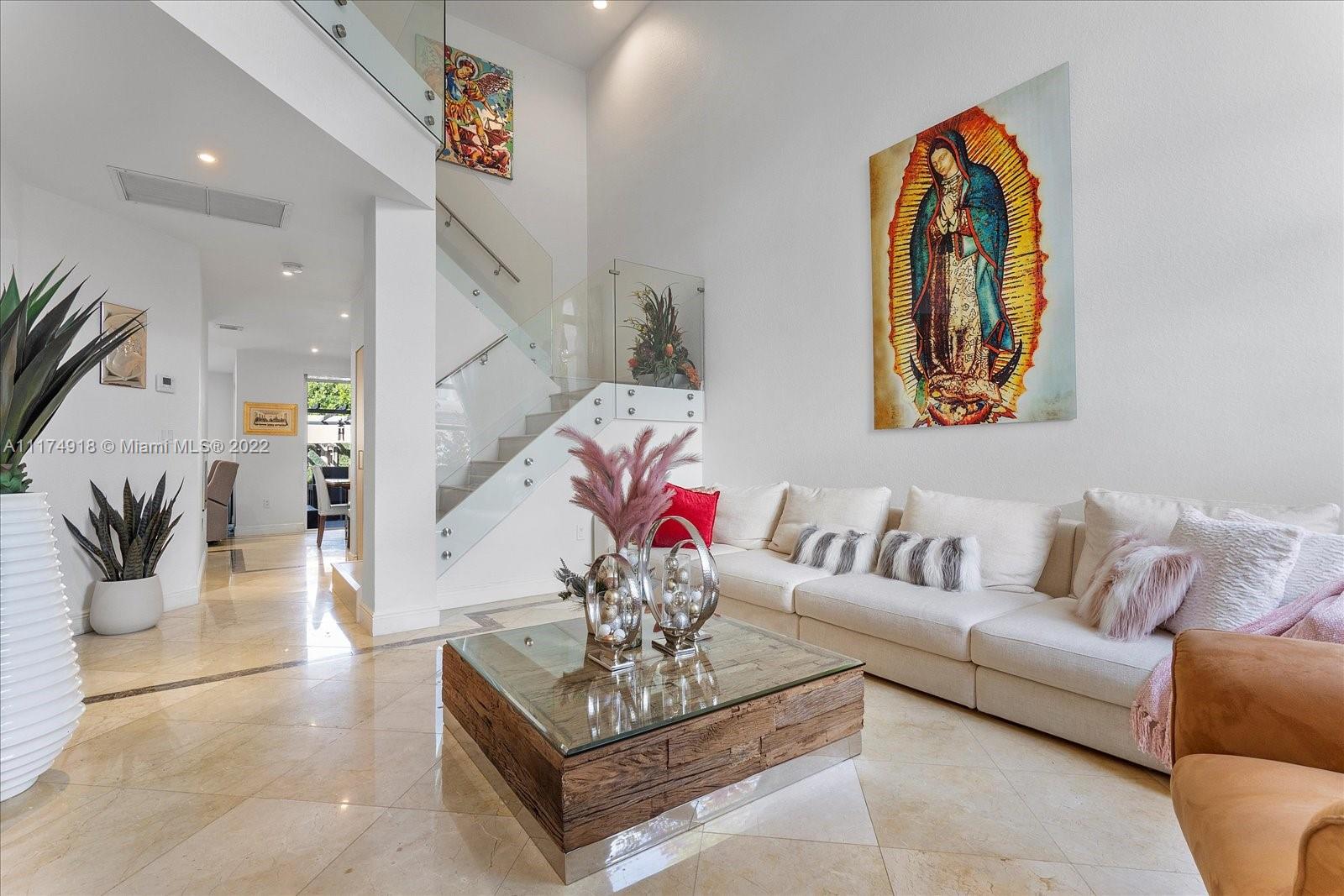 Doral Isles Doral, FL 33178 - Photo 7 of 38 a living room with furniture and wooden floor