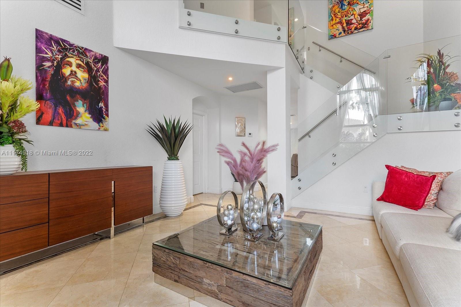 Doral Isles Doral, FL 33178 - Photo 8 of 38 a living room with furniture