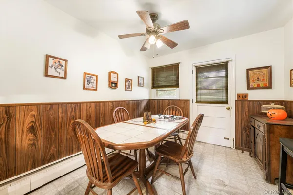 a view of a dining room with furniture