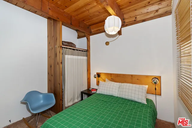 a room with furniture and a window