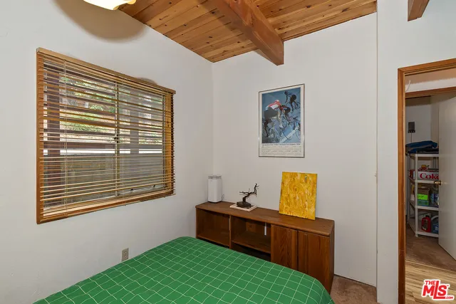 a view of a two chairs in the balcony
