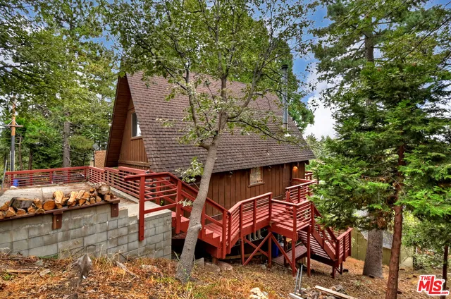 a view of balcony with wooden floor