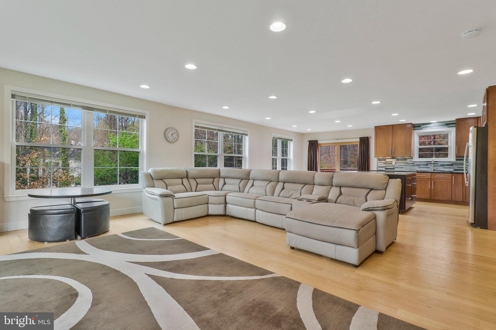8543 Howell Road Bethesda, MD 20817 - Photo 6 of 24 a living room with furniture and a large window