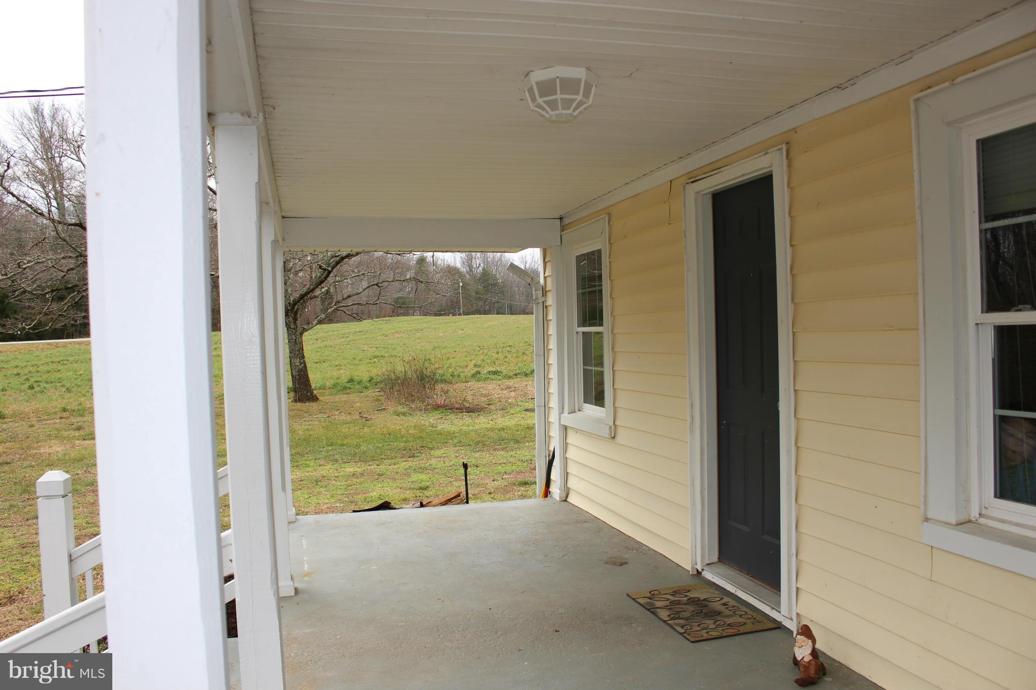 9446 Indiantown Road King George, VA 22485 - Photo 4 of 18 WIDE COUNTRY FRONT PORCH