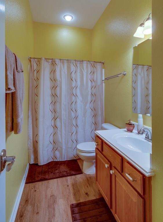 13049 Fencerow Road Fort Worth, TX 76244 - Photo 19 of 32 a bathroom with a sink and a shower