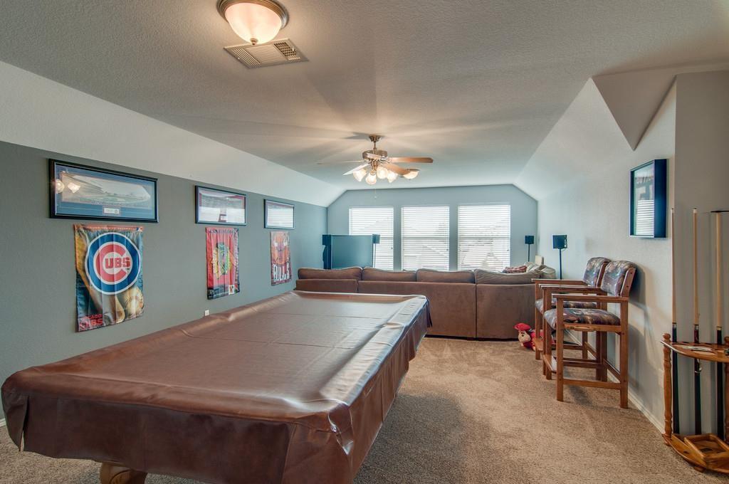 13049 Fencerow Road Fort Worth, TX 76244 - Photo 21 of 32 a living room with dining table