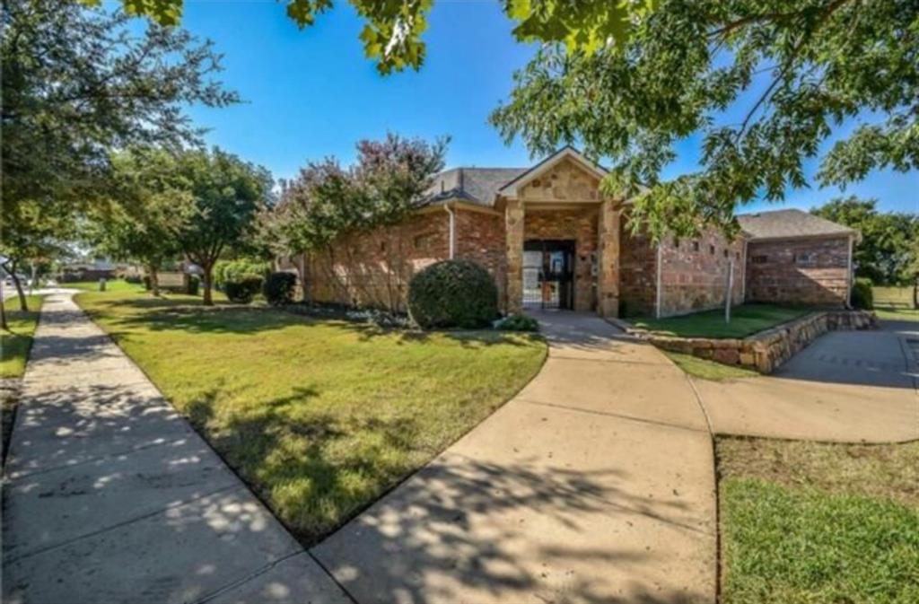 13049 Fencerow Road Fort Worth, TX 76244 - Photo 27 of 32 a front view of a house with garden