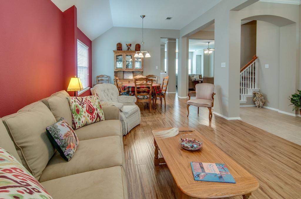 13049 Fencerow Road Fort Worth, TX 76244 - Photo 7 of 32 a living room with furniture and wooden floor