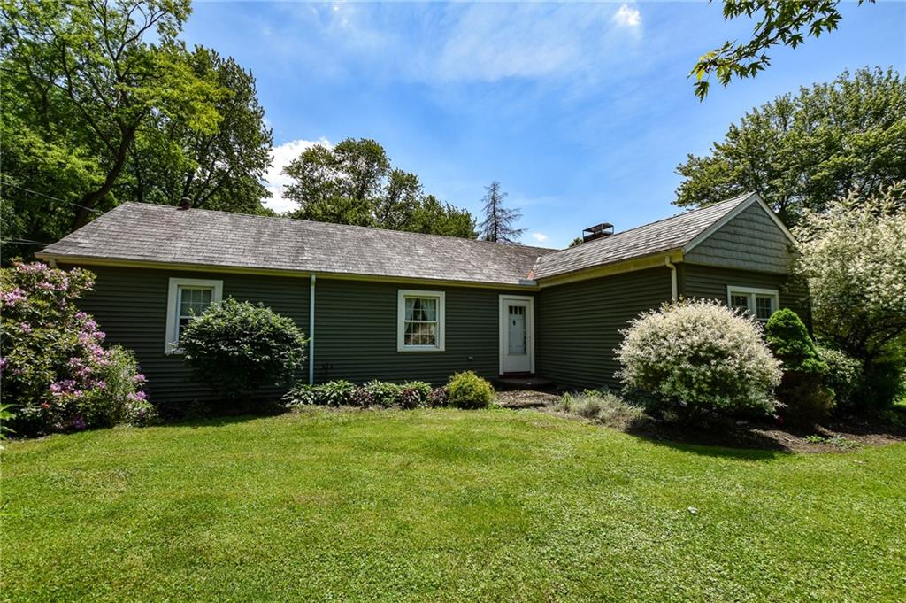 322 Marwood Road Cabot, PA 16023 - Photo 1 of 16 a front view of a house with garden