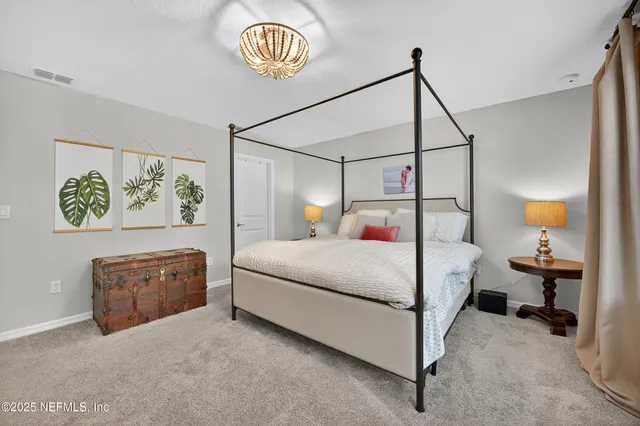 a bathroom with a shower and a sink