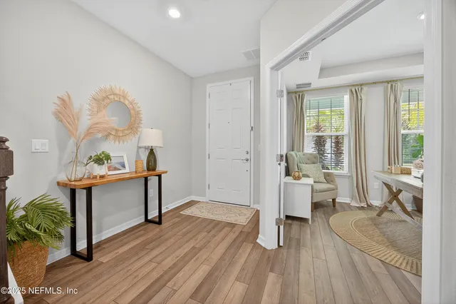 a work room with furniture and a window