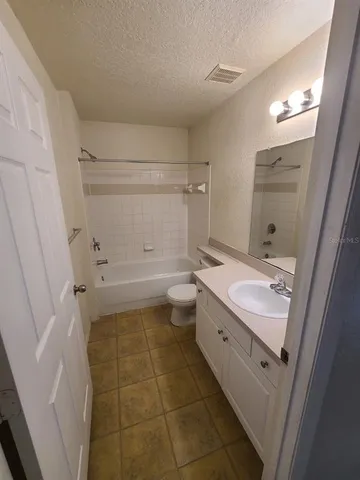 a view of hallway with closet