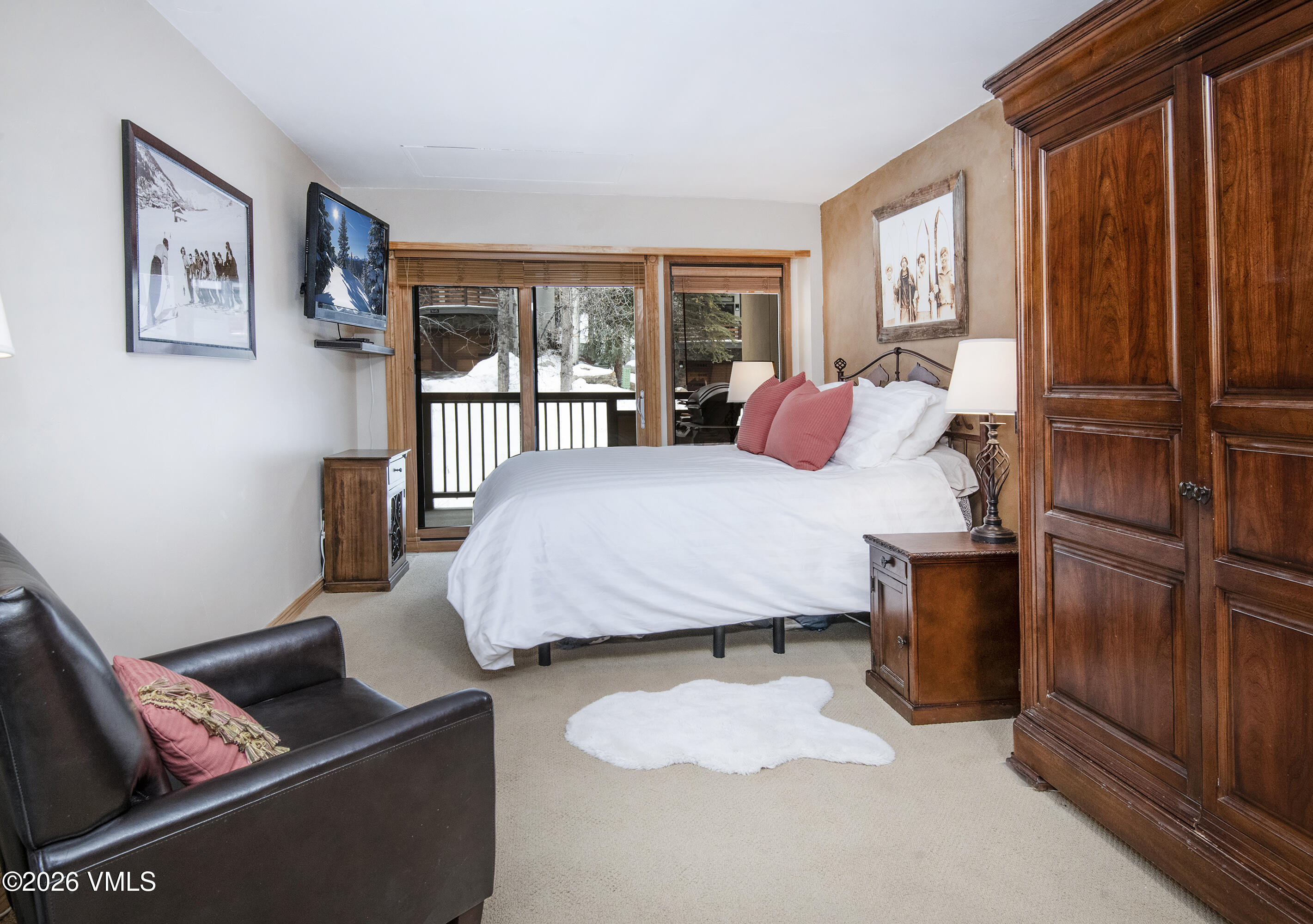 1650 Fall Ridge Road, Unit 202 Vail, CO 81657 - Photo 13 of 32 a bedroom with furniture and a window