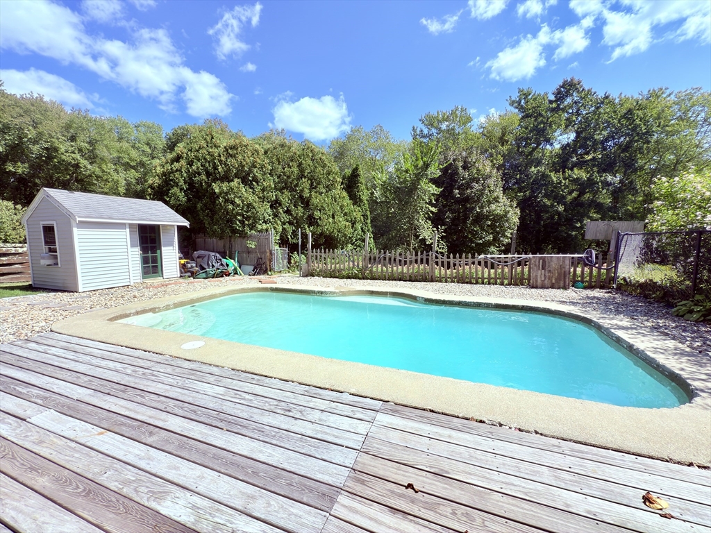 975 South Main Street Bellingham, MA 02019 - Photo 30 of 38 a view of a house with a swimming pool