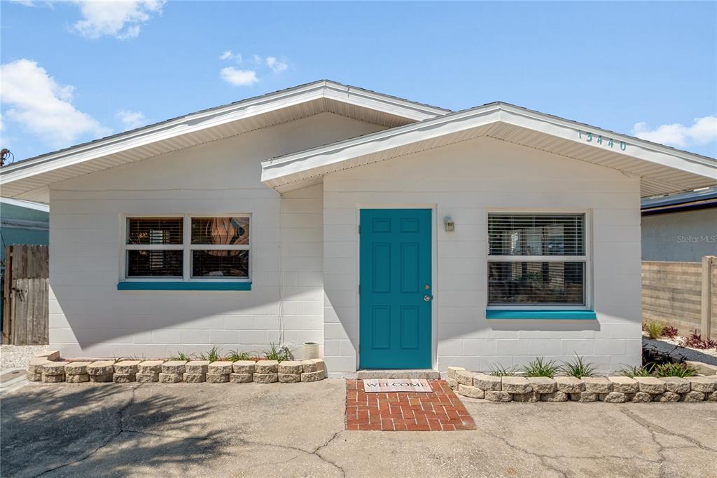 13440 1st Street East Madeira Beach, FL 33708 - Photo 27 of 44 a front view of a house