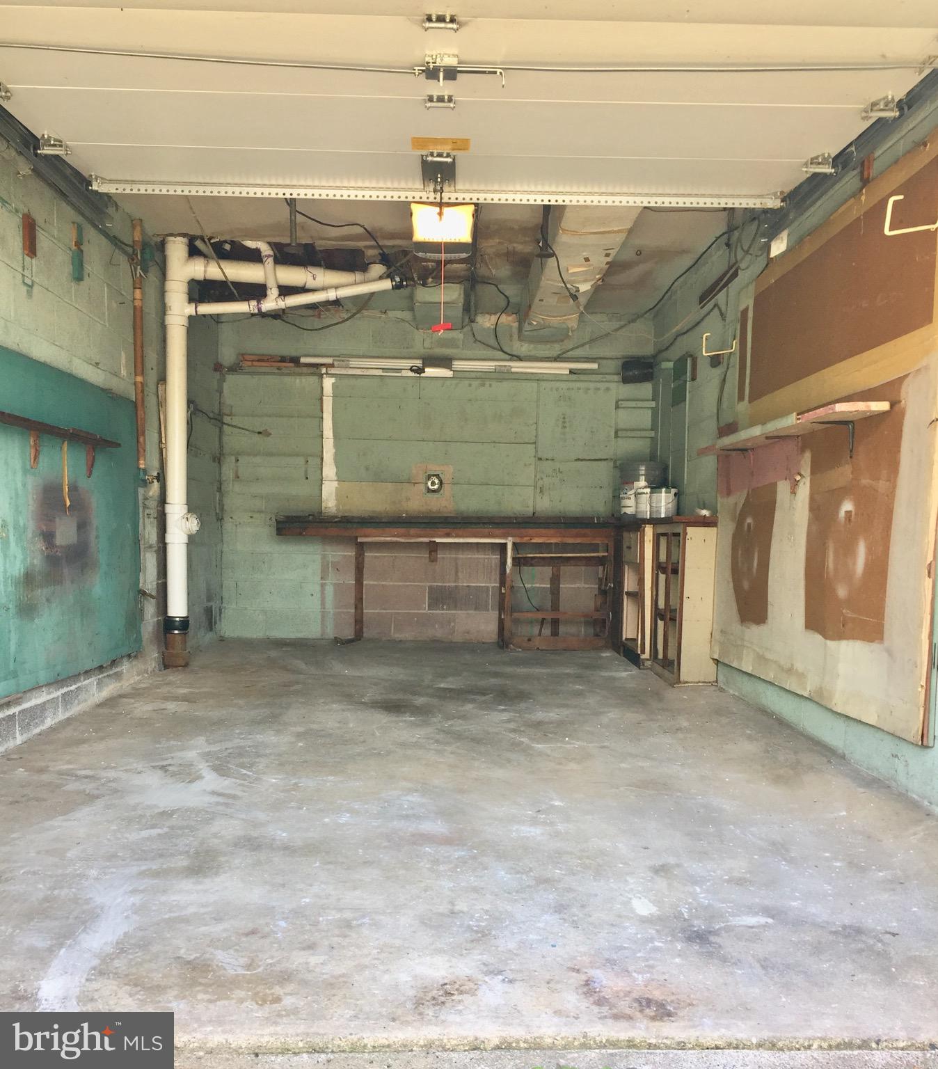 408 Shetland Road Darby, PA 19023 - Photo 36 of 38 Garage with Electric Door Remote