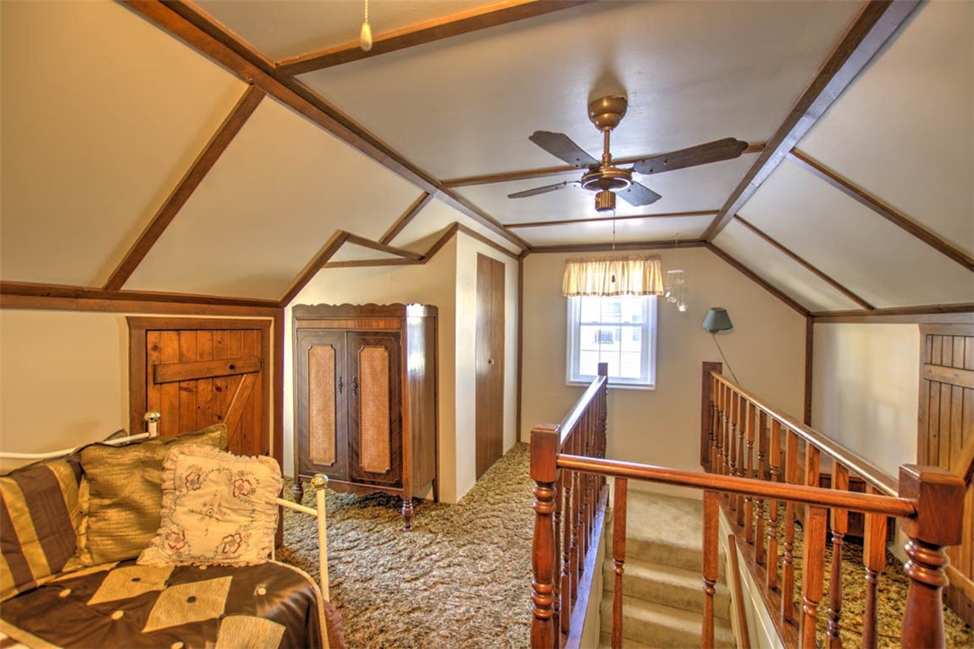 1677 West Sunset Avenue Decatur, IL 62522 - Photo 21 of 32 a very nice looking room with windows and ceiling fan