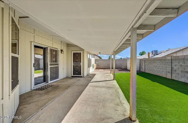 a view of a backyard with garden