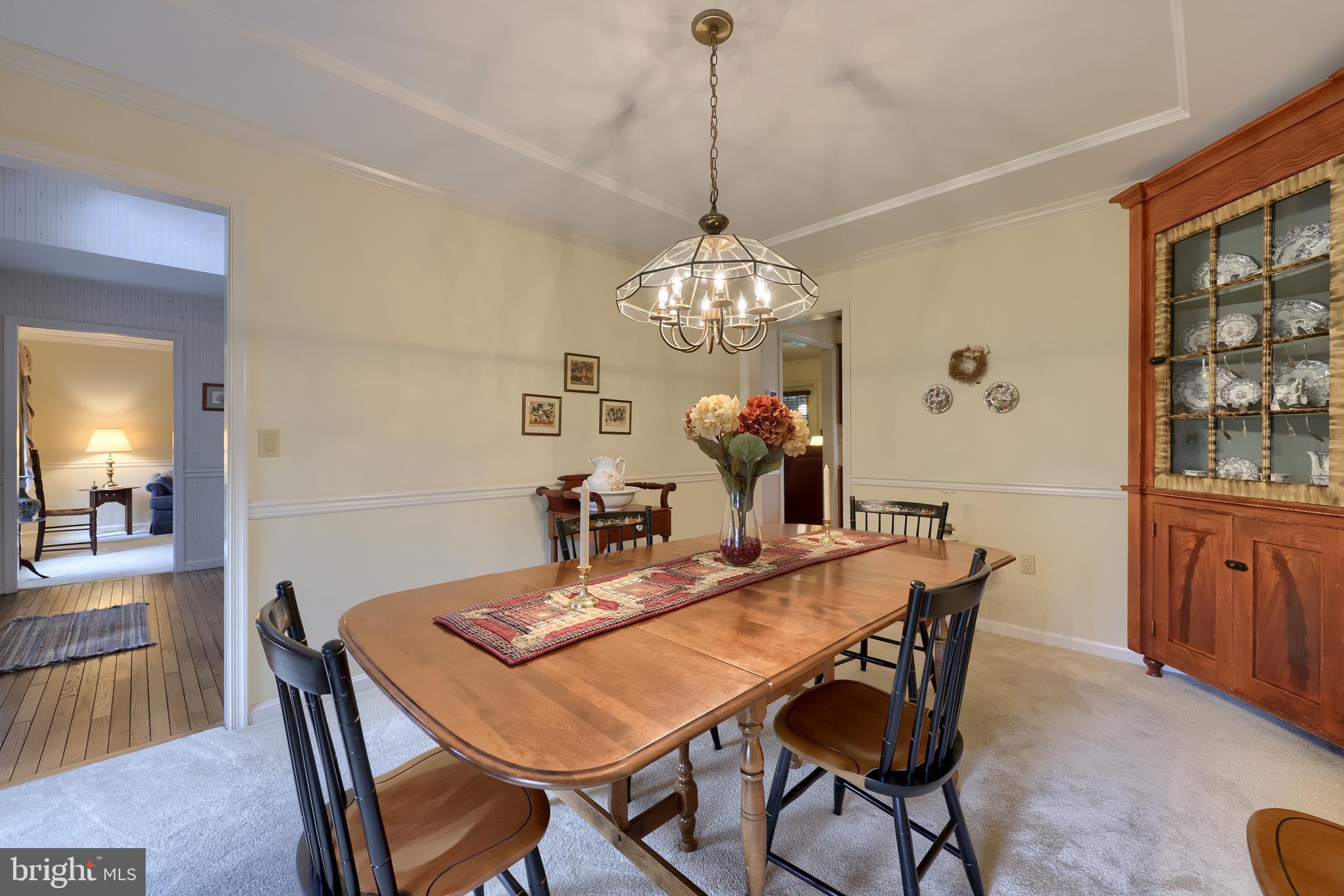 100 Olde Field Drive Lititz, PA 17543 - Photo 22 of 63 a view of a dining room with furniture and chandelier