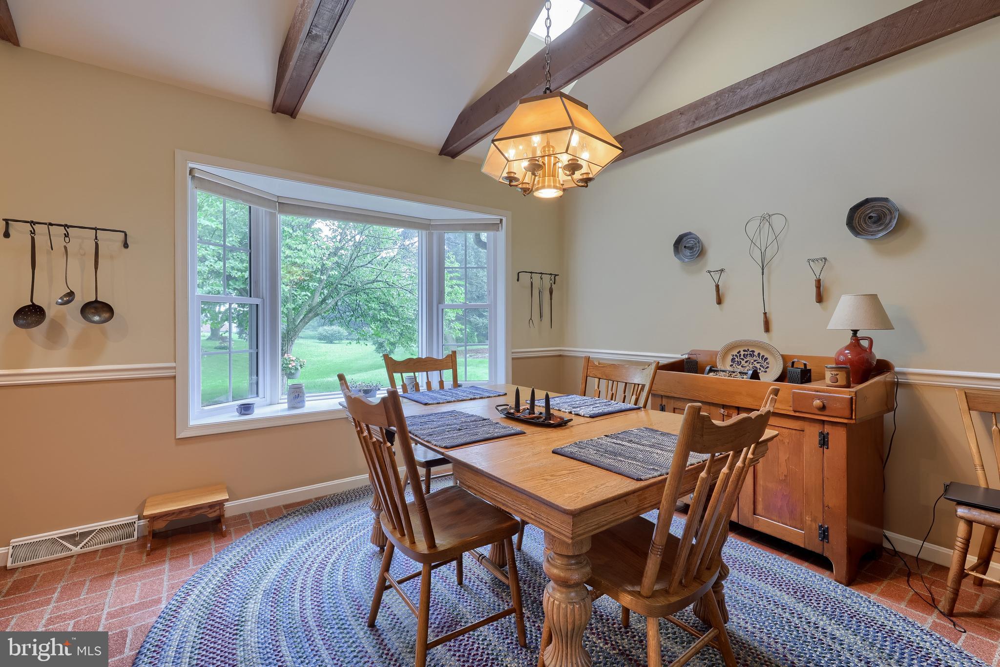 100 Olde Field Drive Lititz, PA 17543 - Photo 30 of 63 a view of a dining room with furniture window and wooden floor