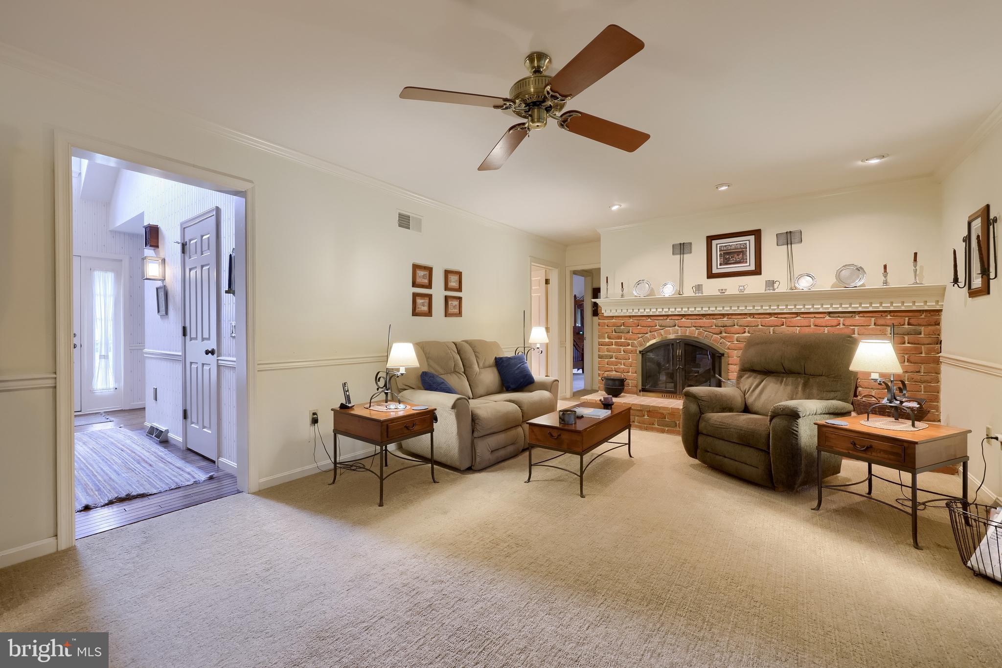 100 Olde Field Drive Lititz, PA 17543 - Photo 34 of 63 a living room with furniture and a fireplace