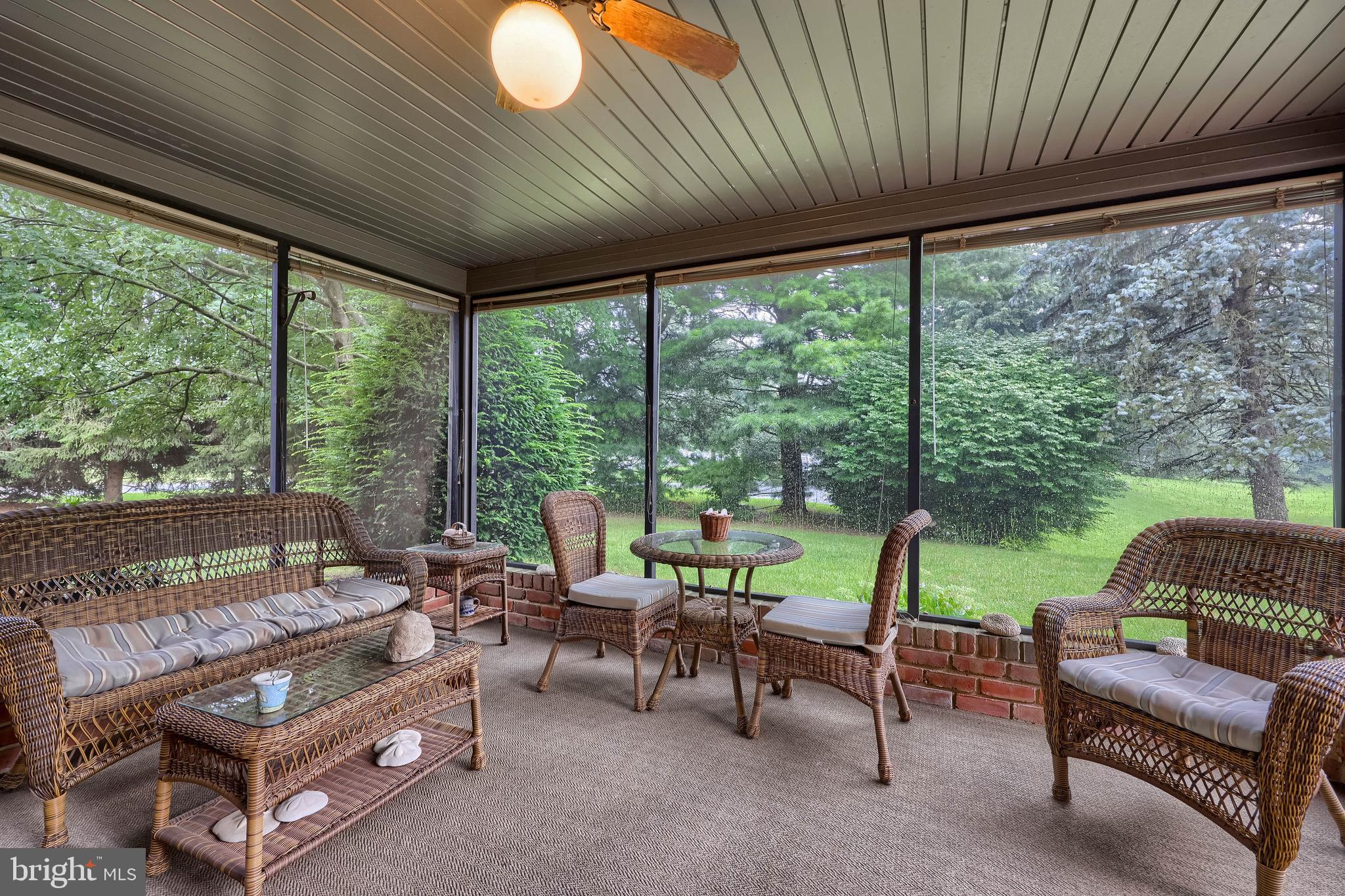 100 Olde Field Drive Lititz, PA 17543 - Photo 38 of 63 a living room with furniture and a floor to ceiling window