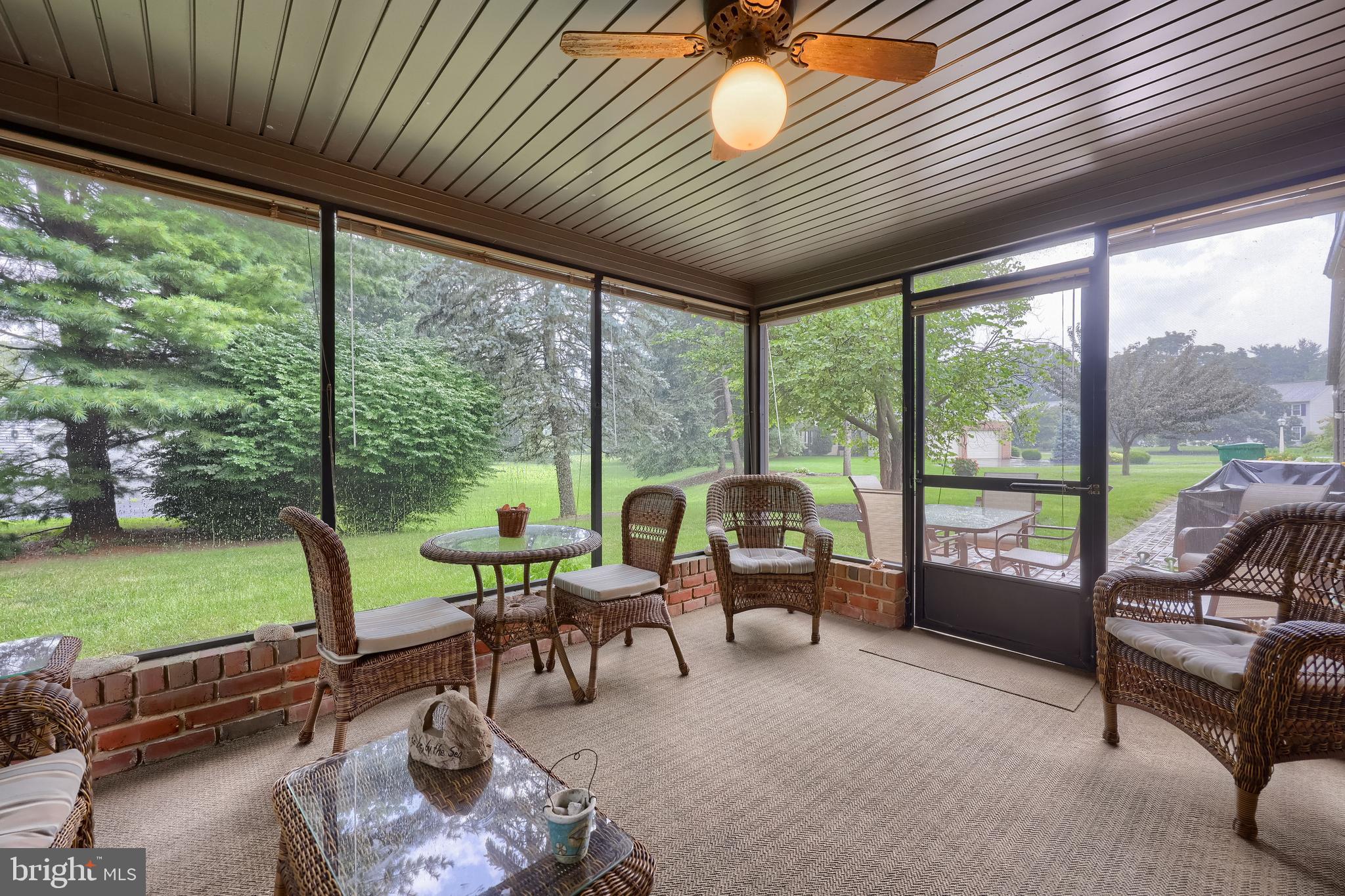 100 Olde Field Drive Lititz, PA 17543 - Photo 39 of 63 a living room with patio furniture and garden