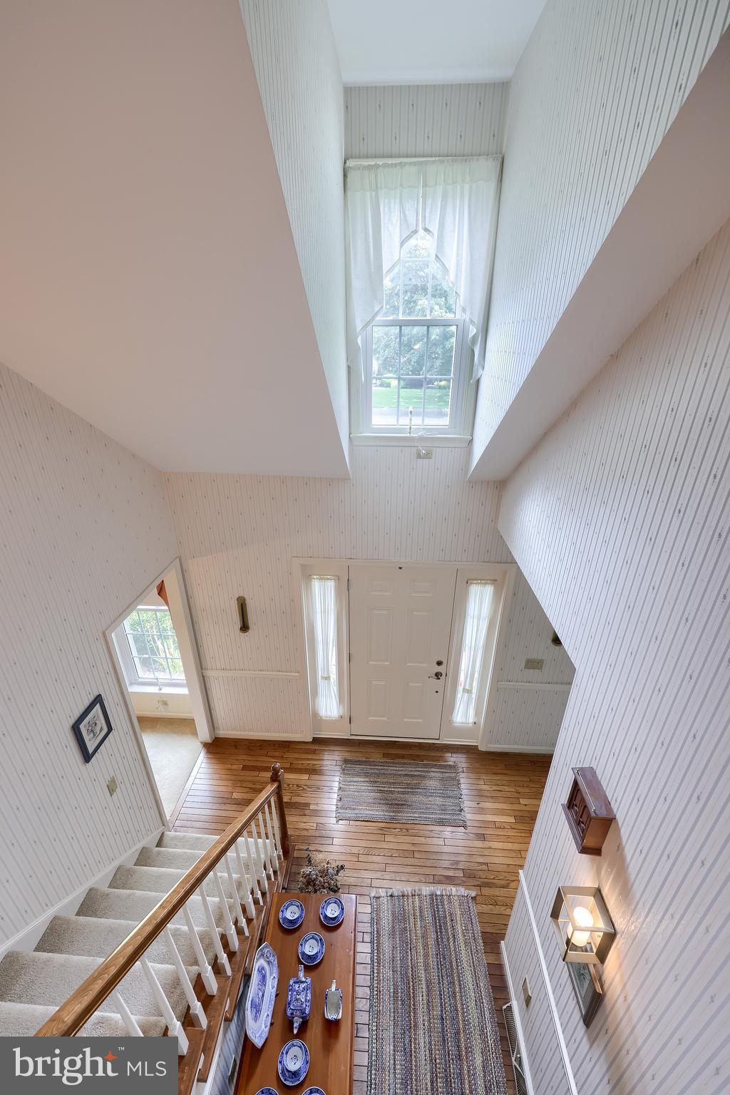 100 Olde Field Drive Lititz, PA 17543 - Photo 46 of 63 a view of an empty room with wooden floor and a window