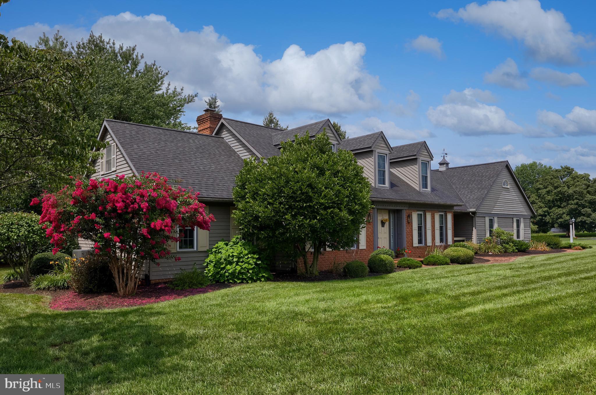 100 Olde Field Drive Lititz, PA 17543 - Photo 5 of 63 a front view of house with a garden