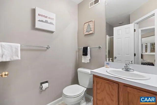 a view of a hallway with seating area