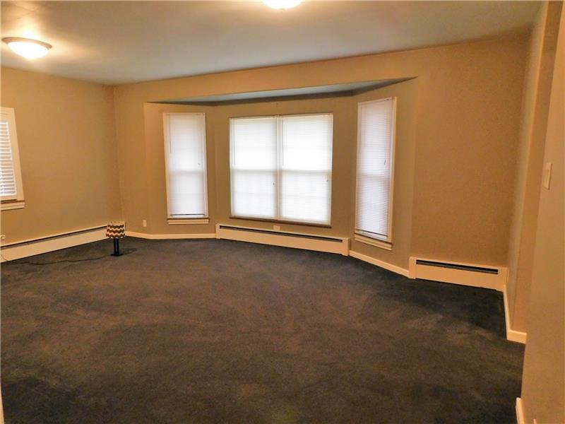 120 Cramer Road Latrobe, PA 15650 - Photo 4 of 22 Living area with ample natural light.