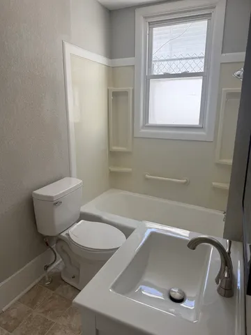 a bathroom with a sink and a toilet