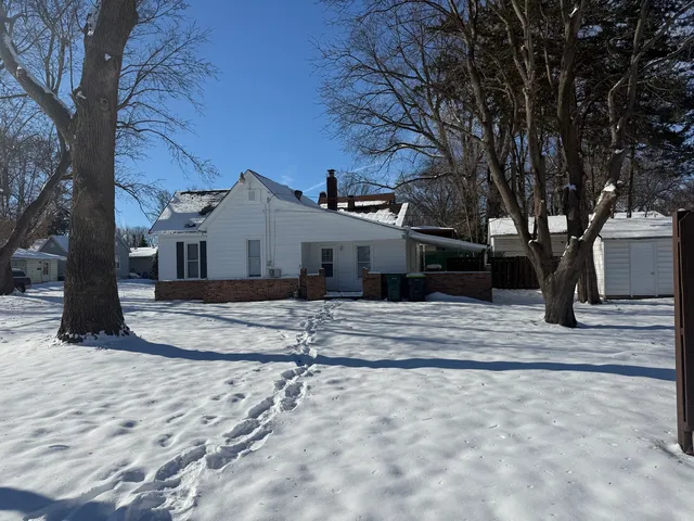 a view of a yard in front of a house