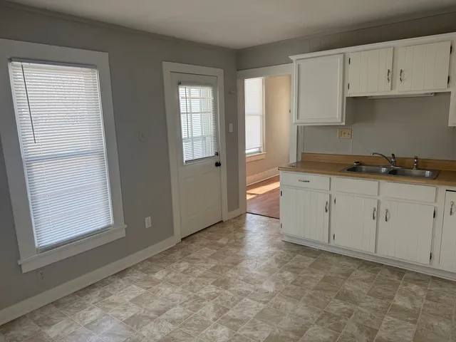 an empty room with windows