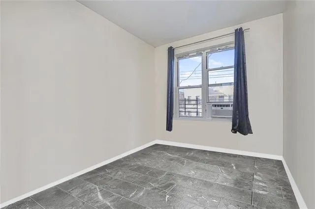 a view of a room with a window