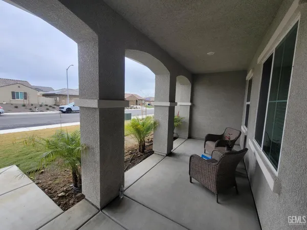 a building outdoor space with patio furniture