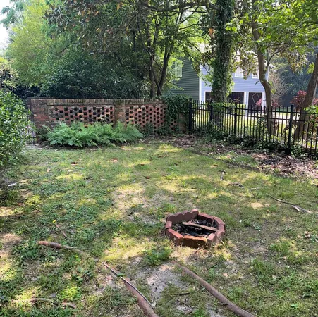 a backyard of a house with lots of green space