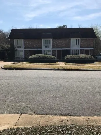 a view of a house with a swimming pool