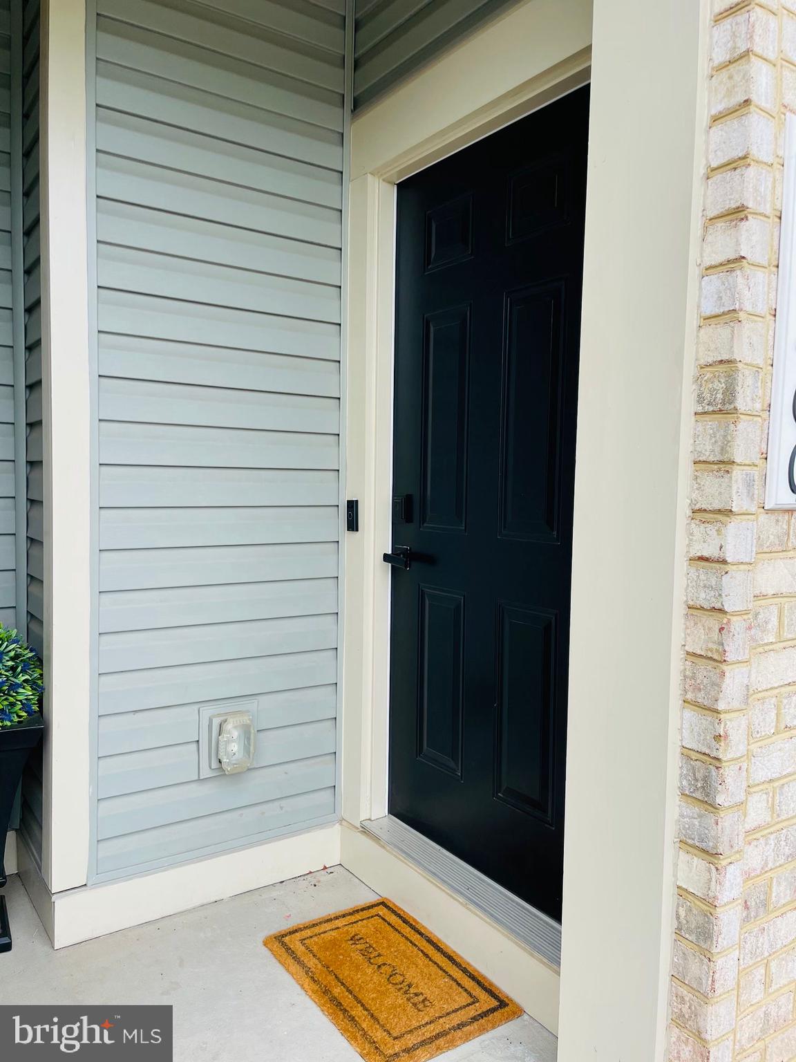 24260 Thurso Square Sterling, VA 20166 - Photo 2 of 16 a view of door