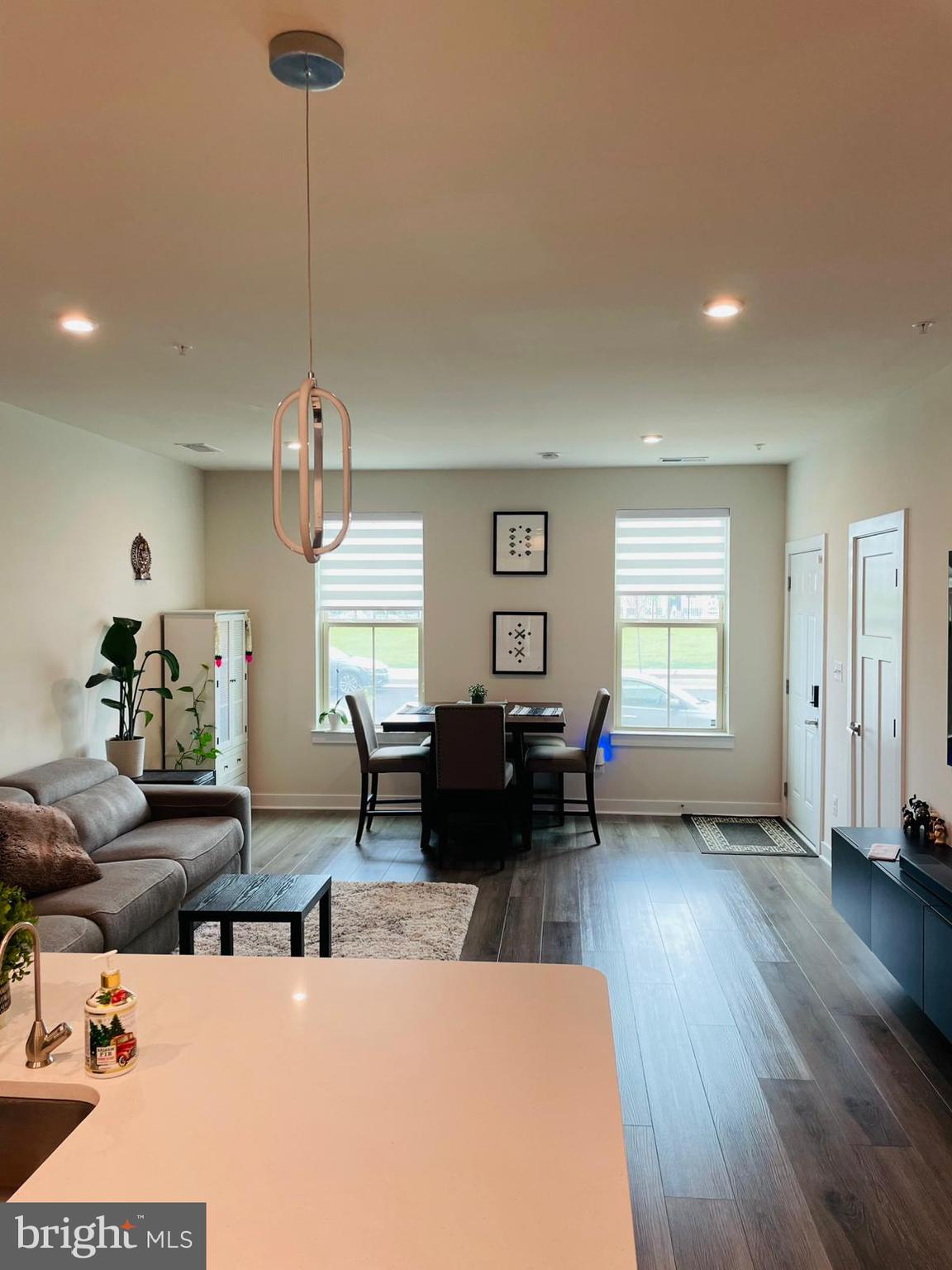 24260 Thurso Square Sterling, VA 20166 - Photo 5 of 16 a living room with furniture window and wooden floor