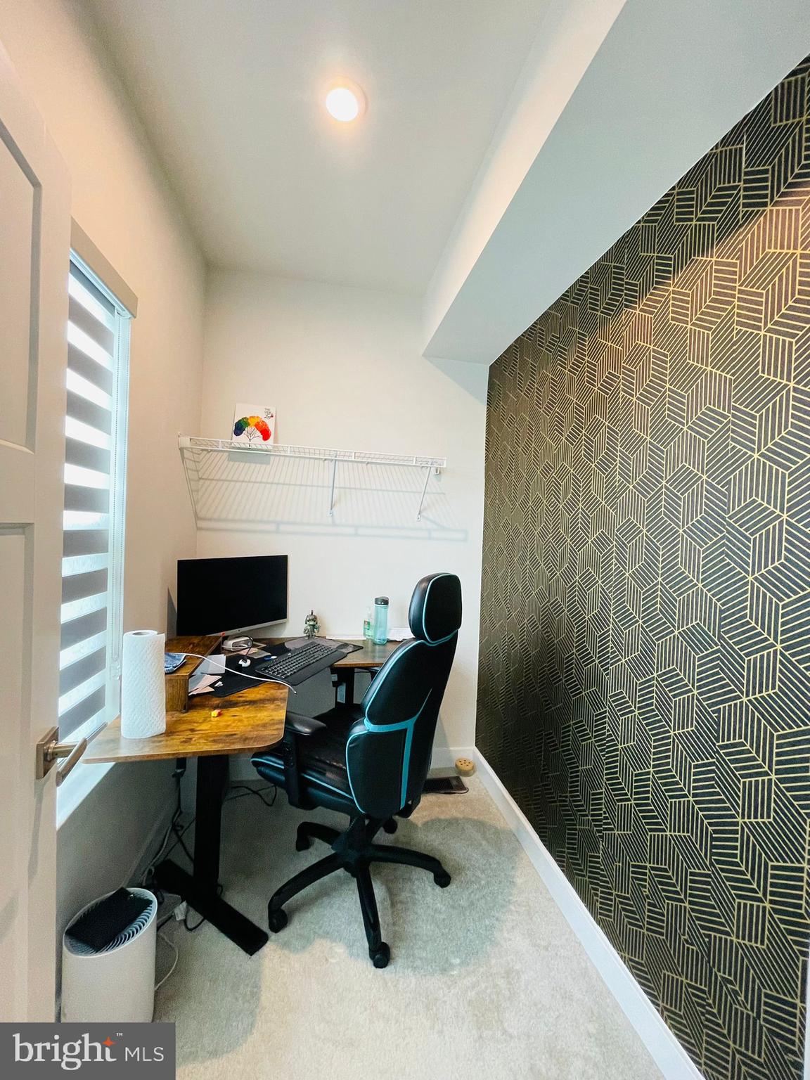 24260 Thurso Square Sterling, VA 20166 - Photo 9 of 16 a view of a workspace with furniture and a window