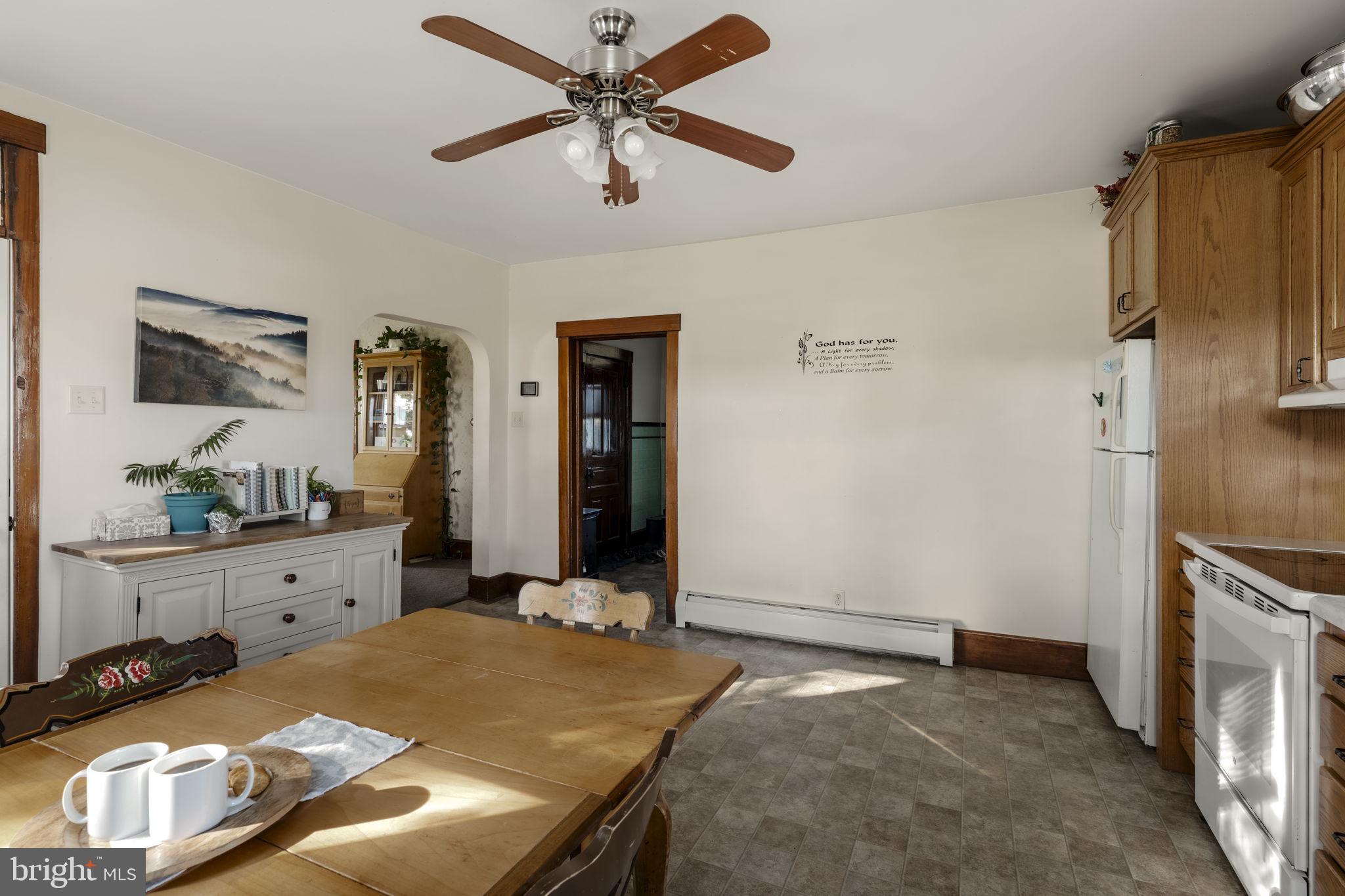 125 Indiantown Road Ephrata, PA 17522 - Photo 14 of 46 a room with a bed and a chandelier