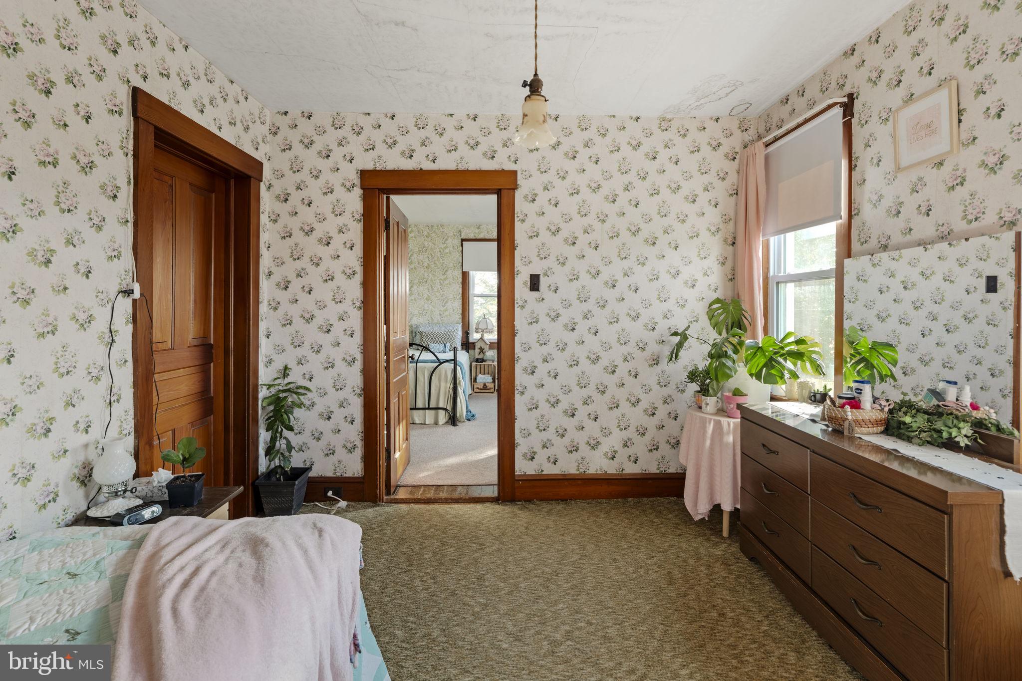 125 Indiantown Road Ephrata, PA 17522 - Photo 19 of 46 a bedroom with a bed table and a chair