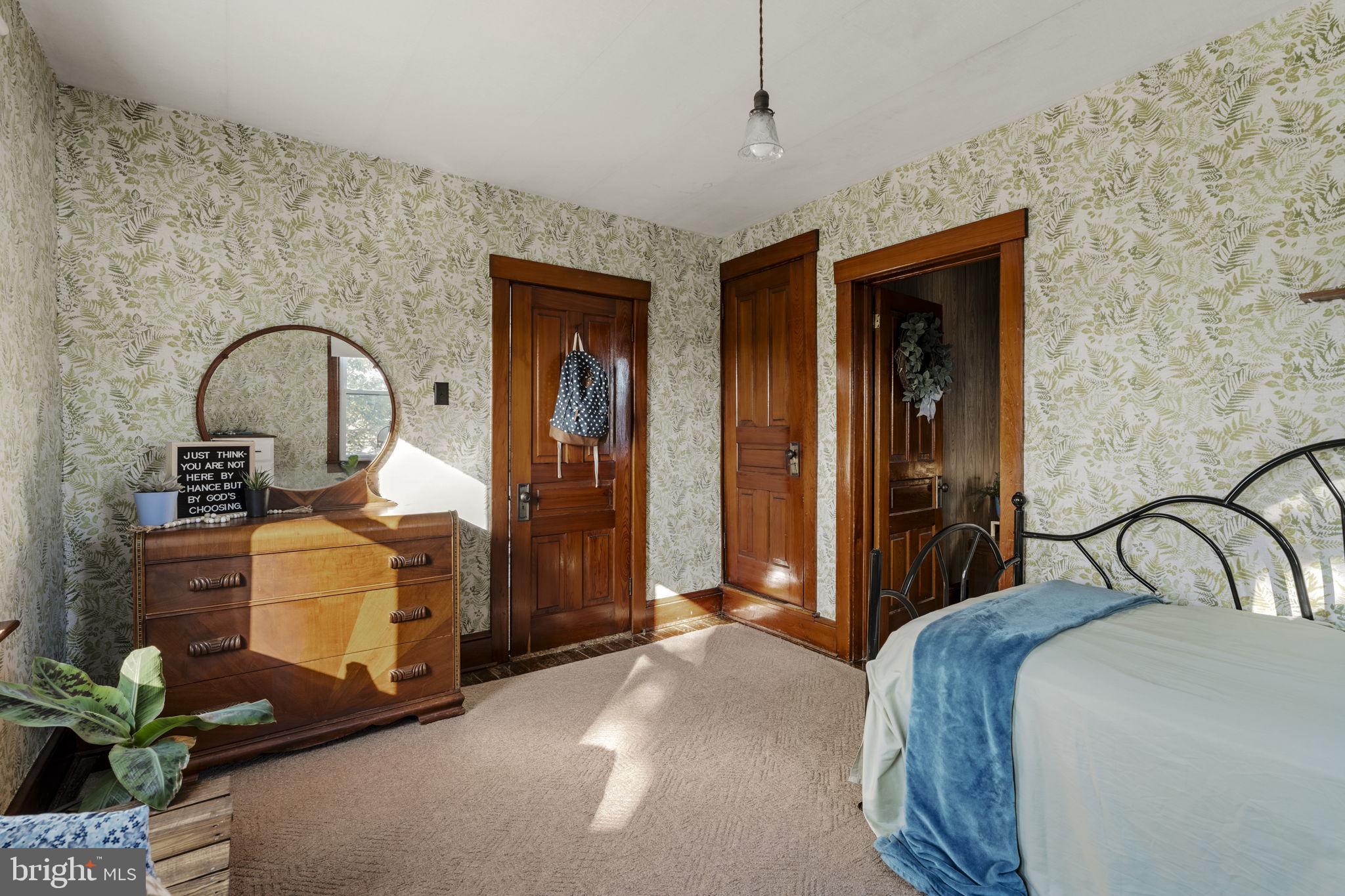 125 Indiantown Road Ephrata, PA 17522 - Photo 21 of 46 a bedroom with bed and a potted plant