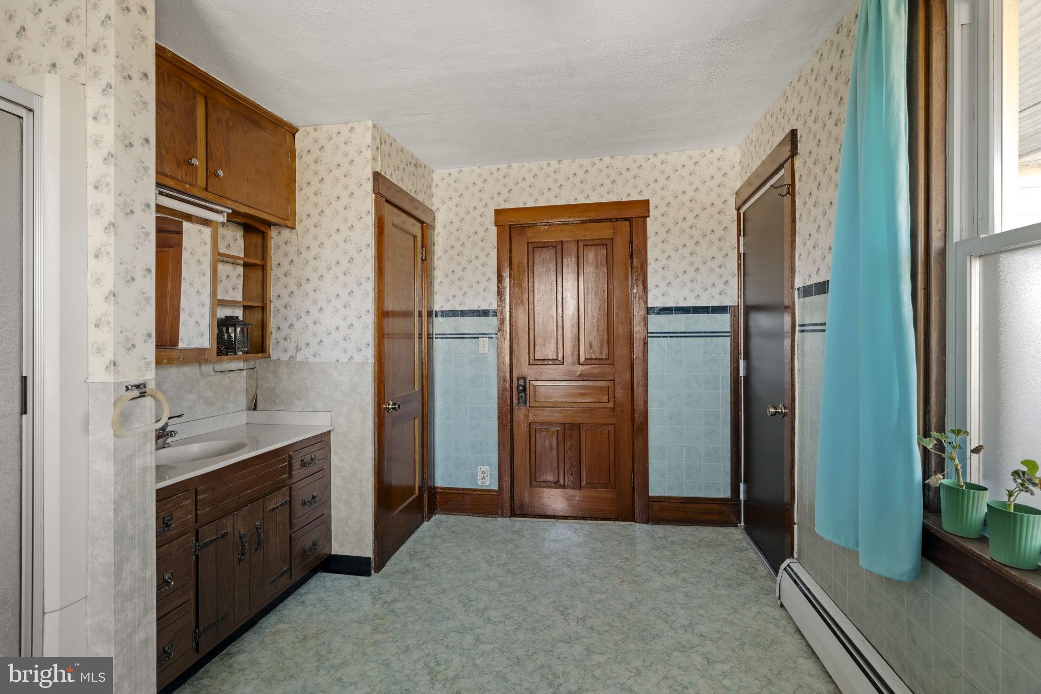 125 Indiantown Road Ephrata, PA 17522 - Photo 27 of 46 a spacious bathroom with a double vanity sink a large mirror and a shower