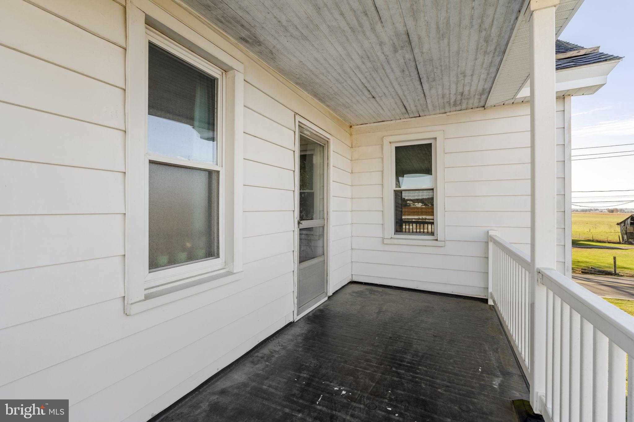 125 Indiantown Road Ephrata, PA 17522 - Photo 29 of 46 a view of a porch with wooden floor and fence