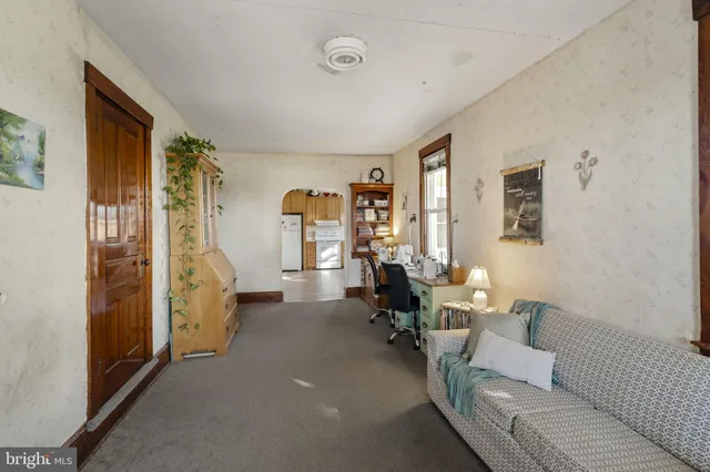 a living room with furniture and a couch