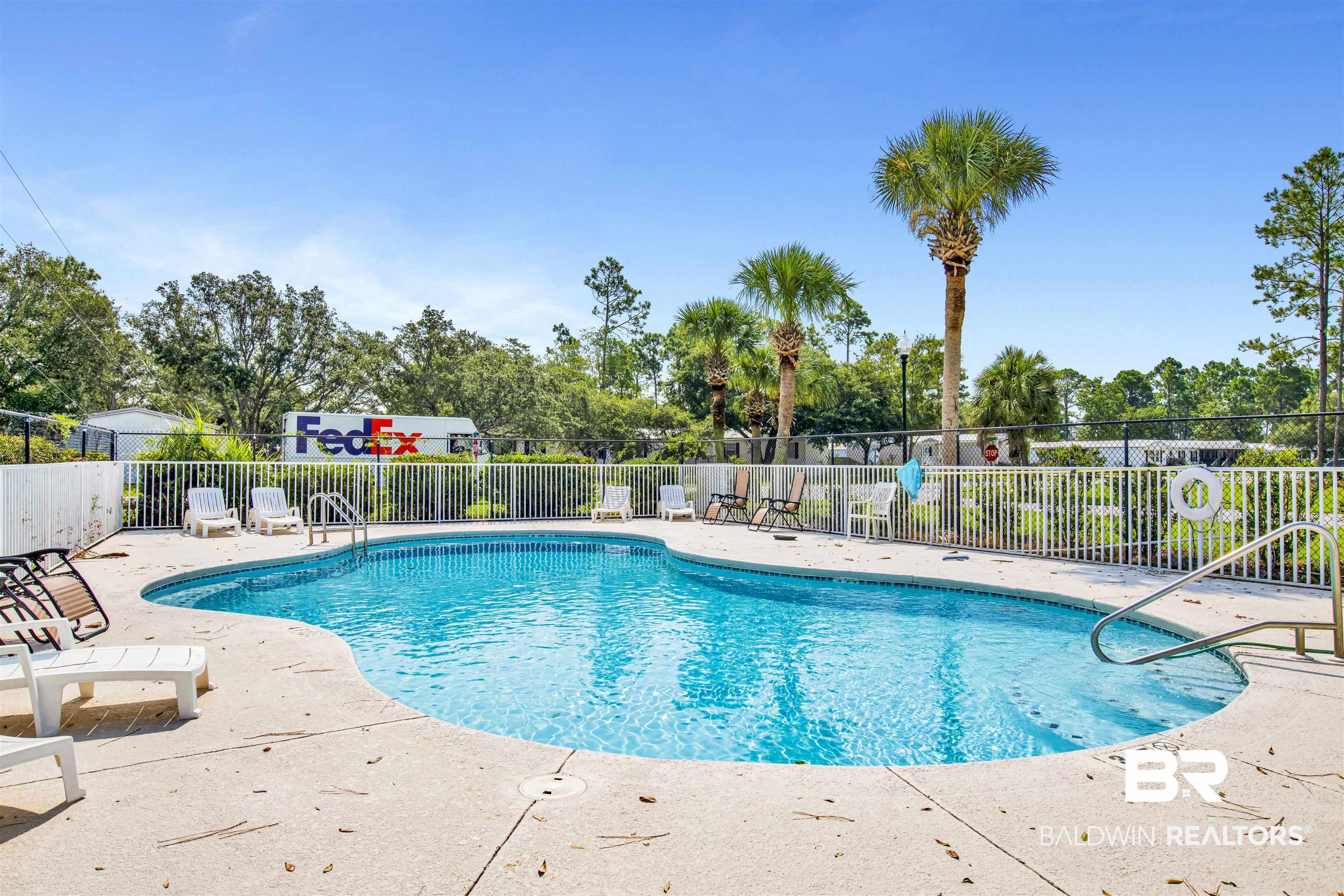 24384 Sailfish Lane Orange Beach, AL 36561 - Photo 22 of 23 View of swimming pool featuring a patio area